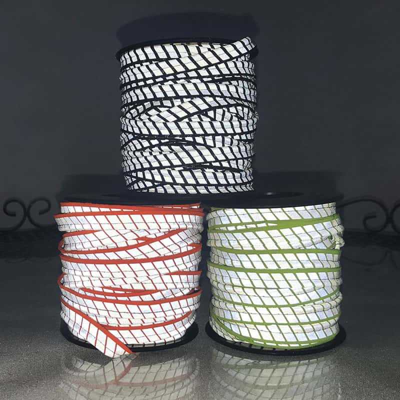 Segmented reflective piping tape